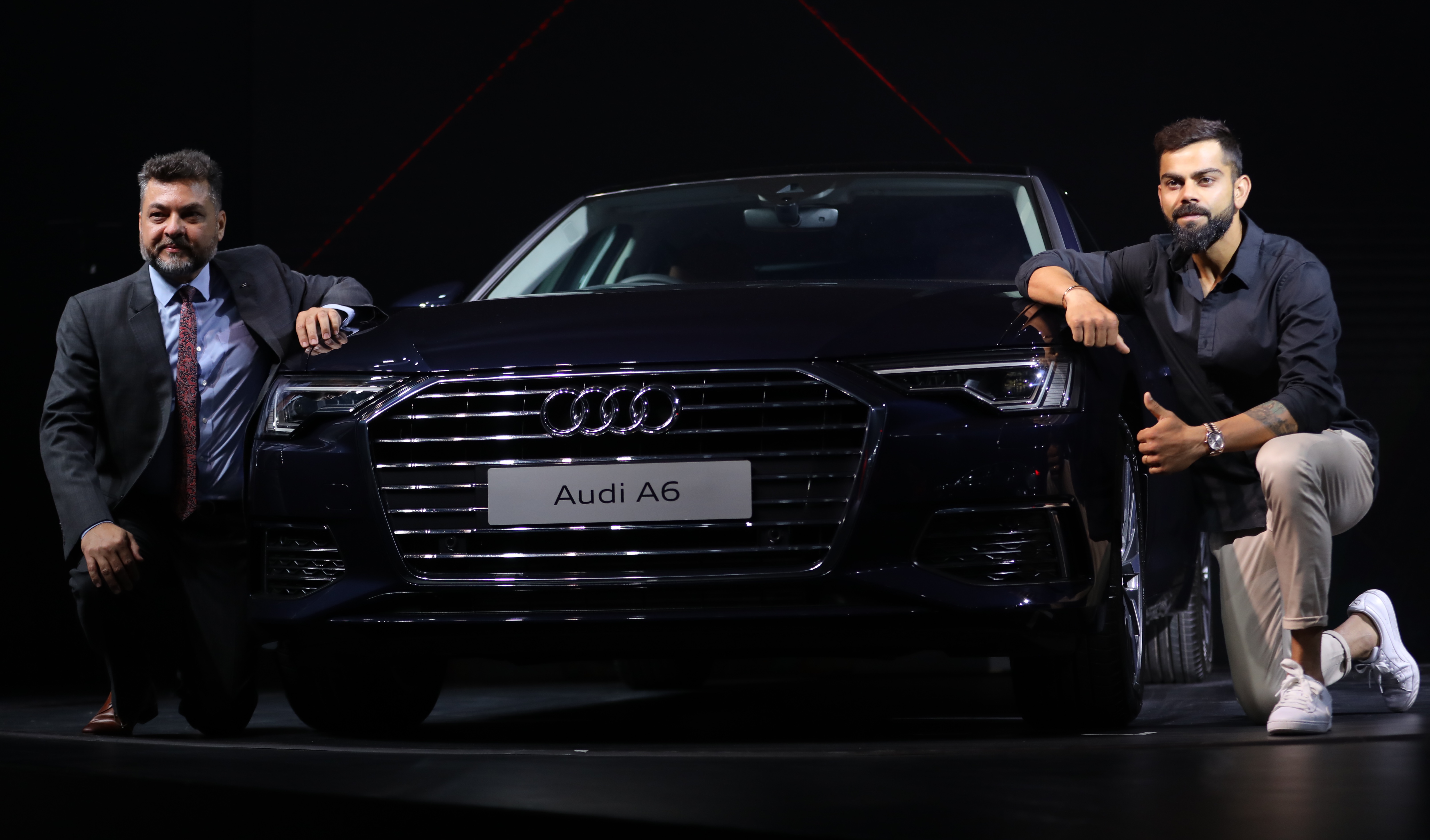 Balbir Singh Dhillon, Head of Audi India and Virat Kohli with the new Audi A6