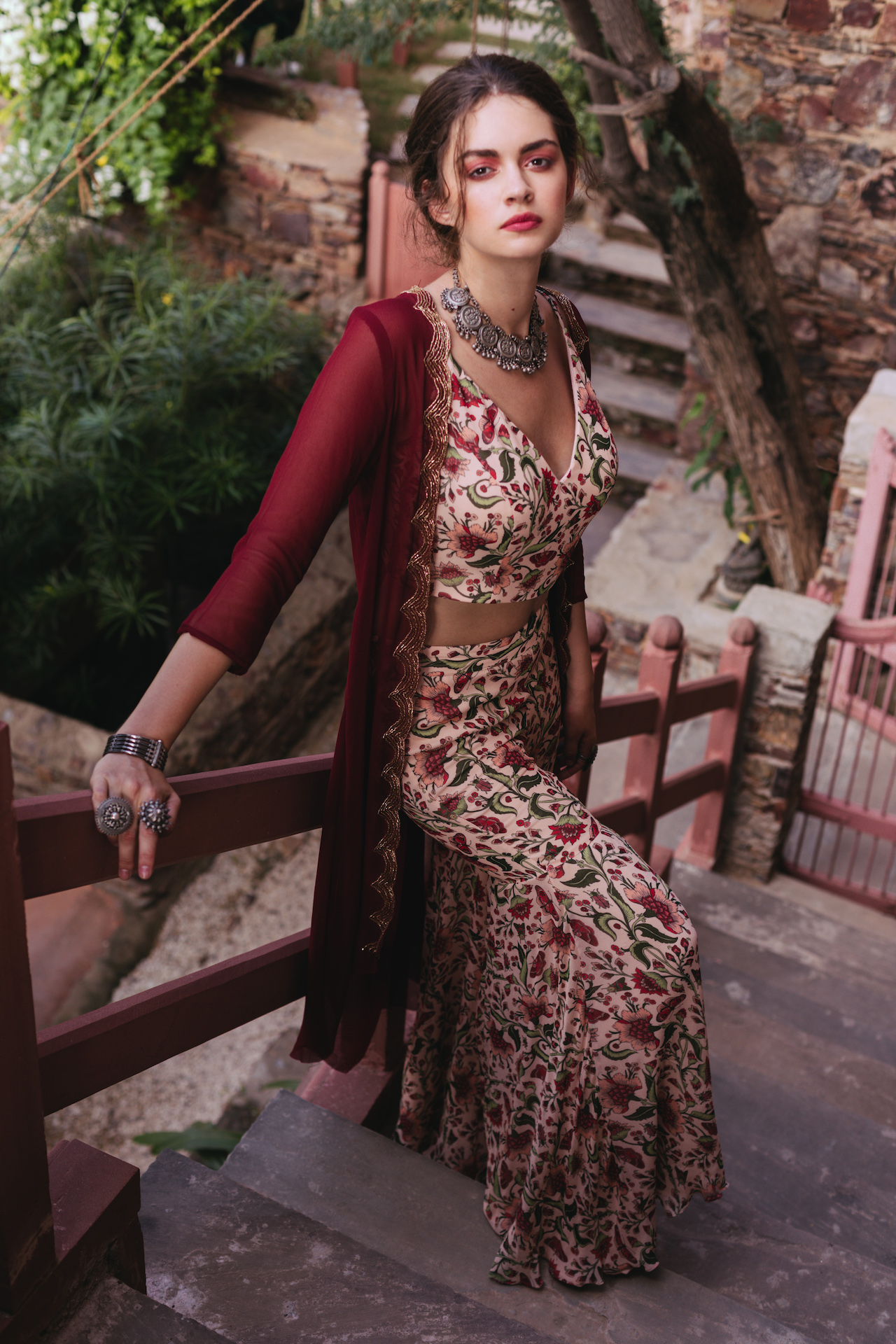 The floral print co-ord set with a long cape that has detailed zardozi hand-embroidery